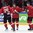 HELSINKI, FINLAND - DECEMBER 26: Switzerland's Tino Kessler #22 celebrates with Simon Kindschi #20 and Marco Forrer #9 after scoring Team Switzerland's first goal of the game during preliminary round action at the 2016 IIHF World Junior Championship. (Photo by Matt Zambonin/HHOF-IIHF Images)

